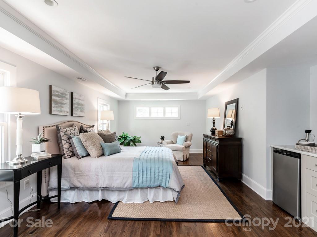 2248 Colony Road Charlotte, NC 28209 - Photo 13 of 27 a living room with couch cabinet and a table