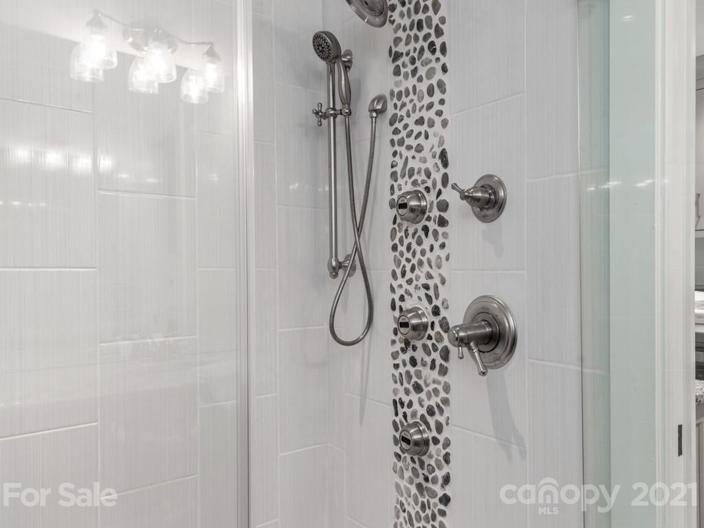 2248 Colony Road Charlotte, NC 28209 - Photo 16 of 27 a bathroom with a shower