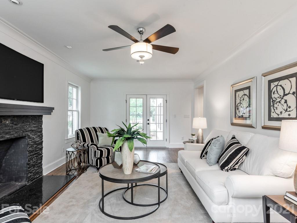 2248 Colony Road Charlotte, NC 28209 - Photo 6 of 27 a living room with furniture and a fireplace