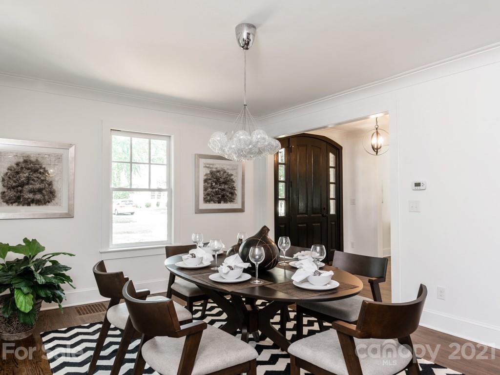 2248 Colony Road Charlotte, NC 28209 - Photo 8 of 27 a view of a dining room with furniture window and outside view