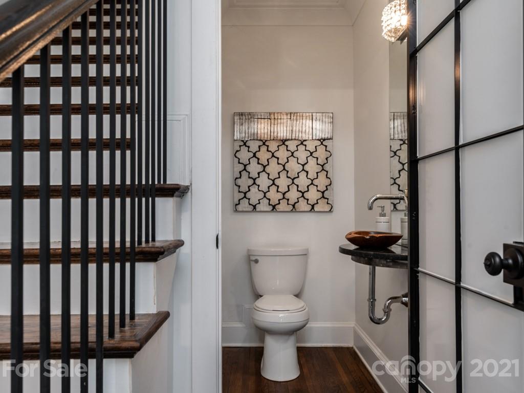 2248 Colony Road Charlotte, NC 28209 - Photo 9 of 27 a bathroom with a toilet and a shower