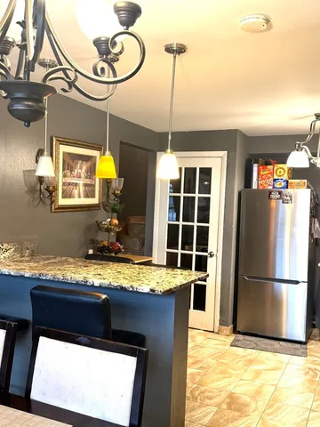 a room with furniture and a window