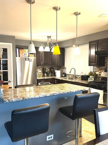 a view of a living room with furniture