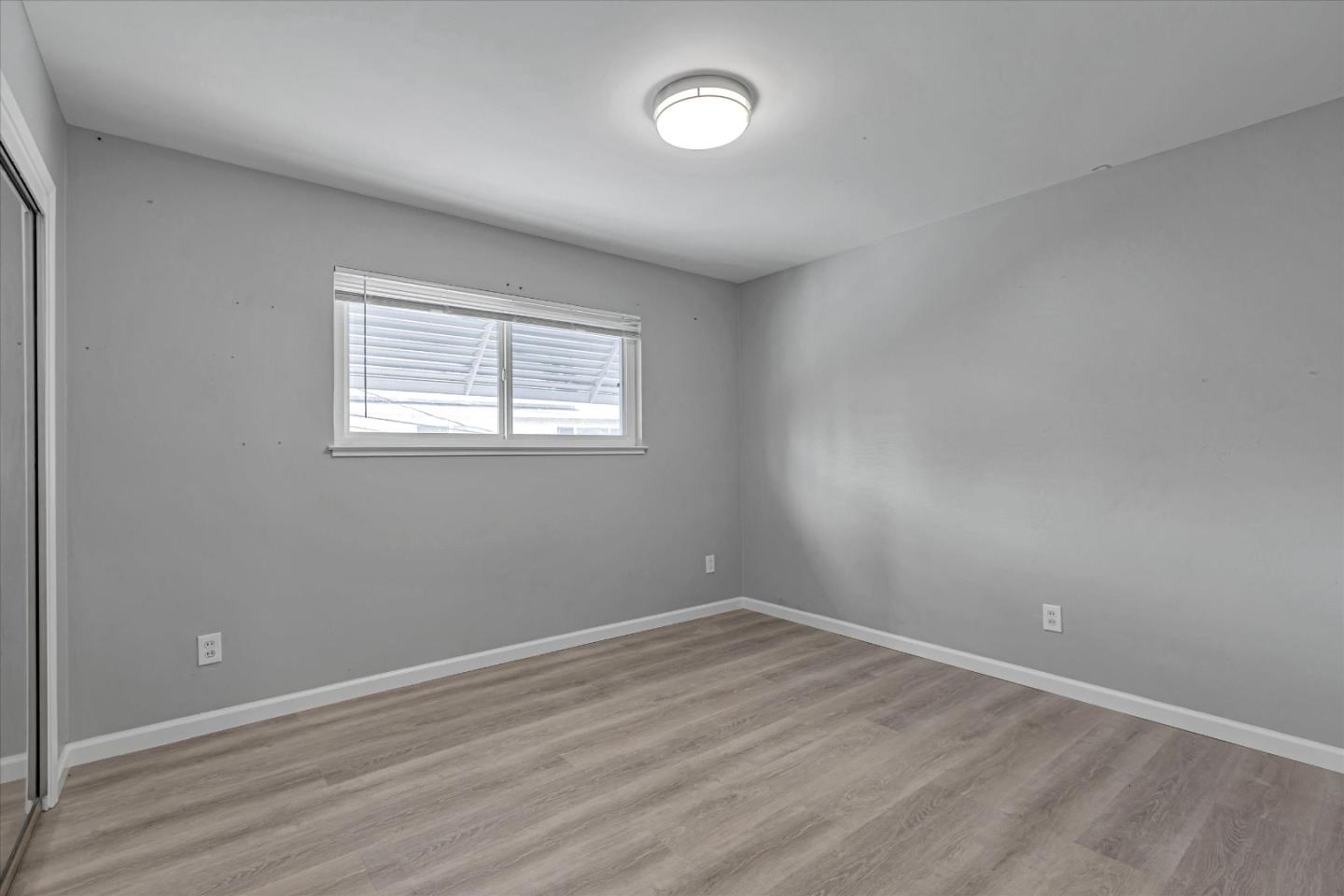 477 Greendale Way San Jose, CA 95129 - Photo 22 of 33 wooden floor in an empty room with a window