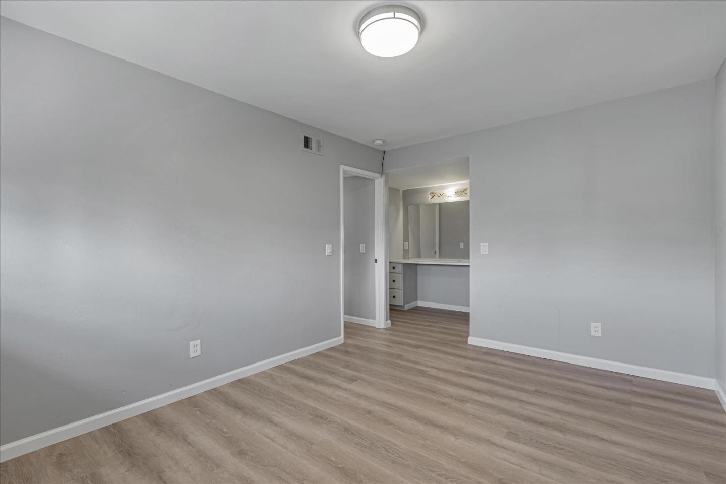 477 Greendale Way San Jose, CA 95129 - Photo 25 of 33 a view of an empty room with wooden floor