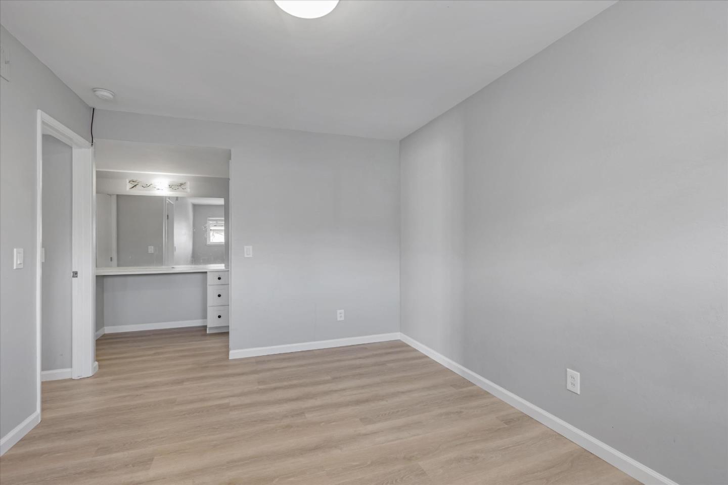 477 Greendale Way San Jose, CA 95129 - Photo 26 of 33 a view of an empty room and wooden floor