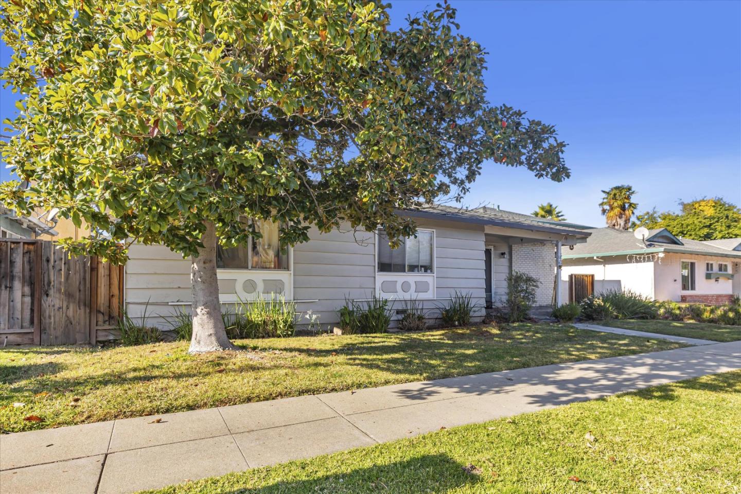 477 Greendale Way San Jose, CA 95129 - Photo 5 of 33 a view of a house with a yard