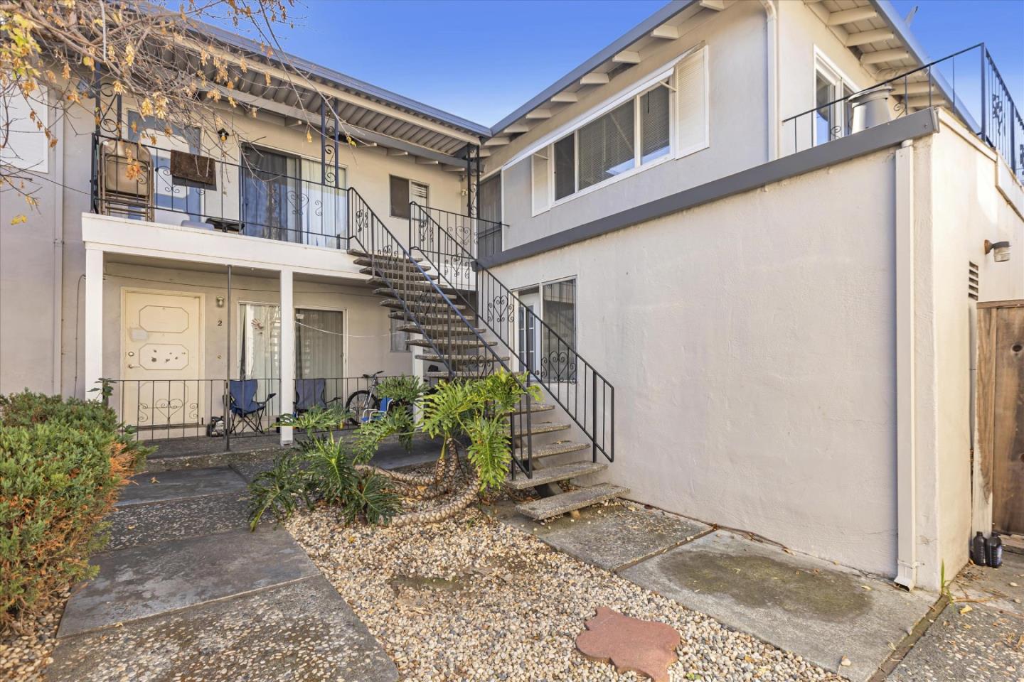 477 Greendale Way San Jose, CA 95129 - Photo 7 of 33 a front view of a house with garden