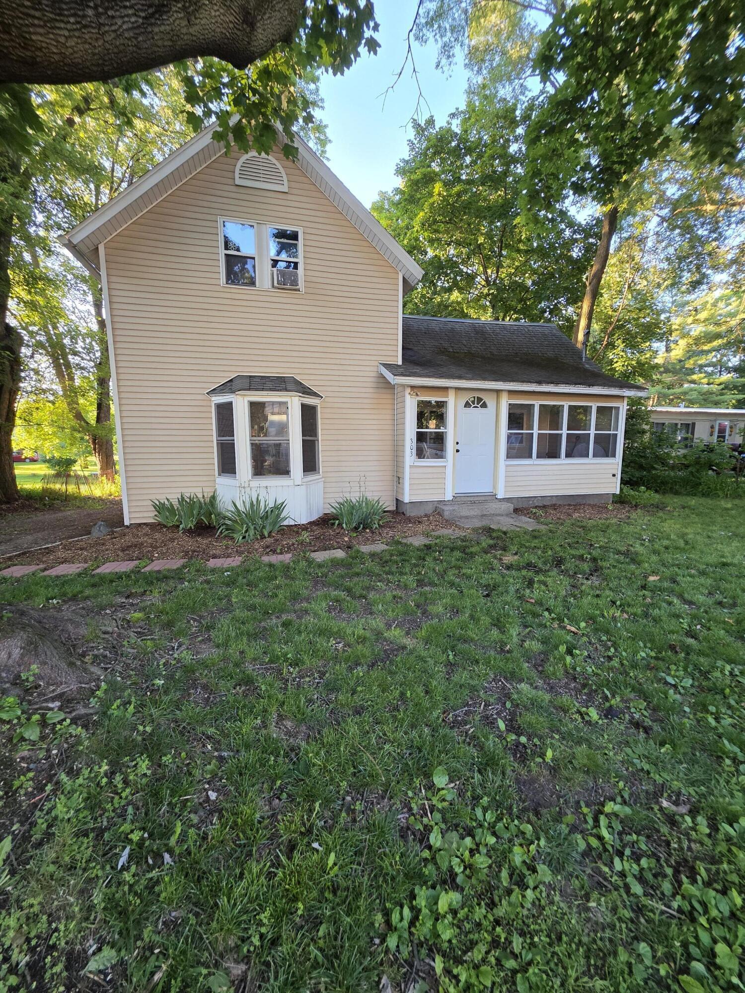 303 Rathburn Howard City, MI 49329 - Photo 1 of 28 3451