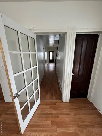 a view of entryway with wooden floor