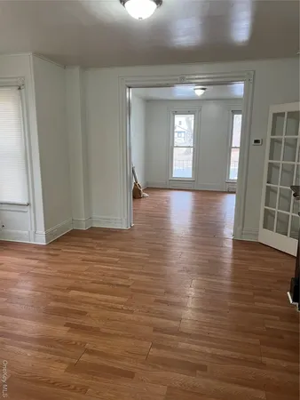 a view of livingroom and hardwood floor