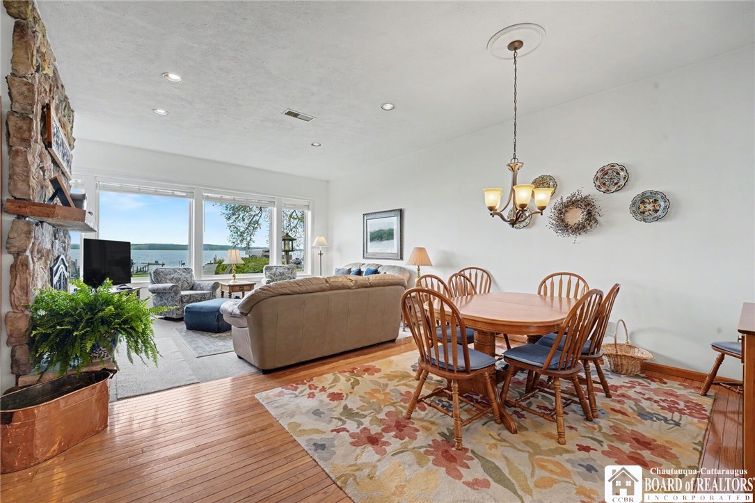 4568 Warners Bay Road Ellery, NY 14712 - Photo 13 of 43 Open dining and living area with hardwood floors,