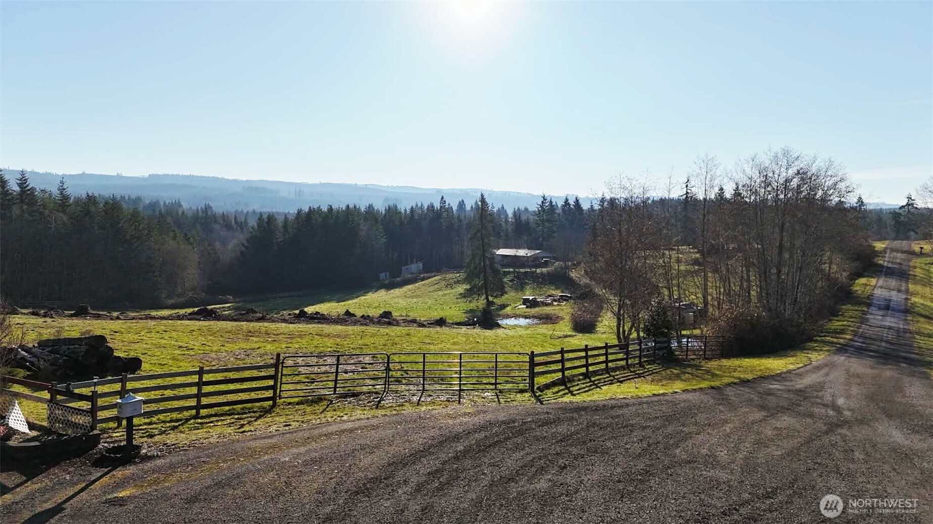 18 Overlake Lane McCleary, WA 98557 - Photo 20 of 25 a view of a bench in a backyard