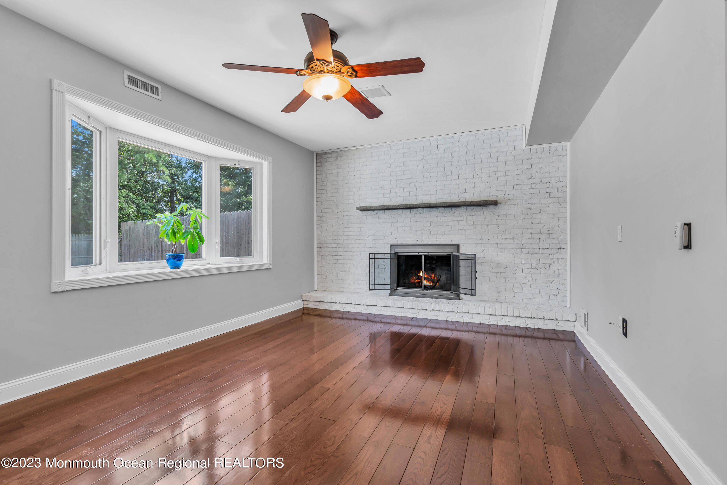 19 Poplar Street Howell, NJ 07731 - Photo 27 of 62 a view of empty room with wooden floor and fan