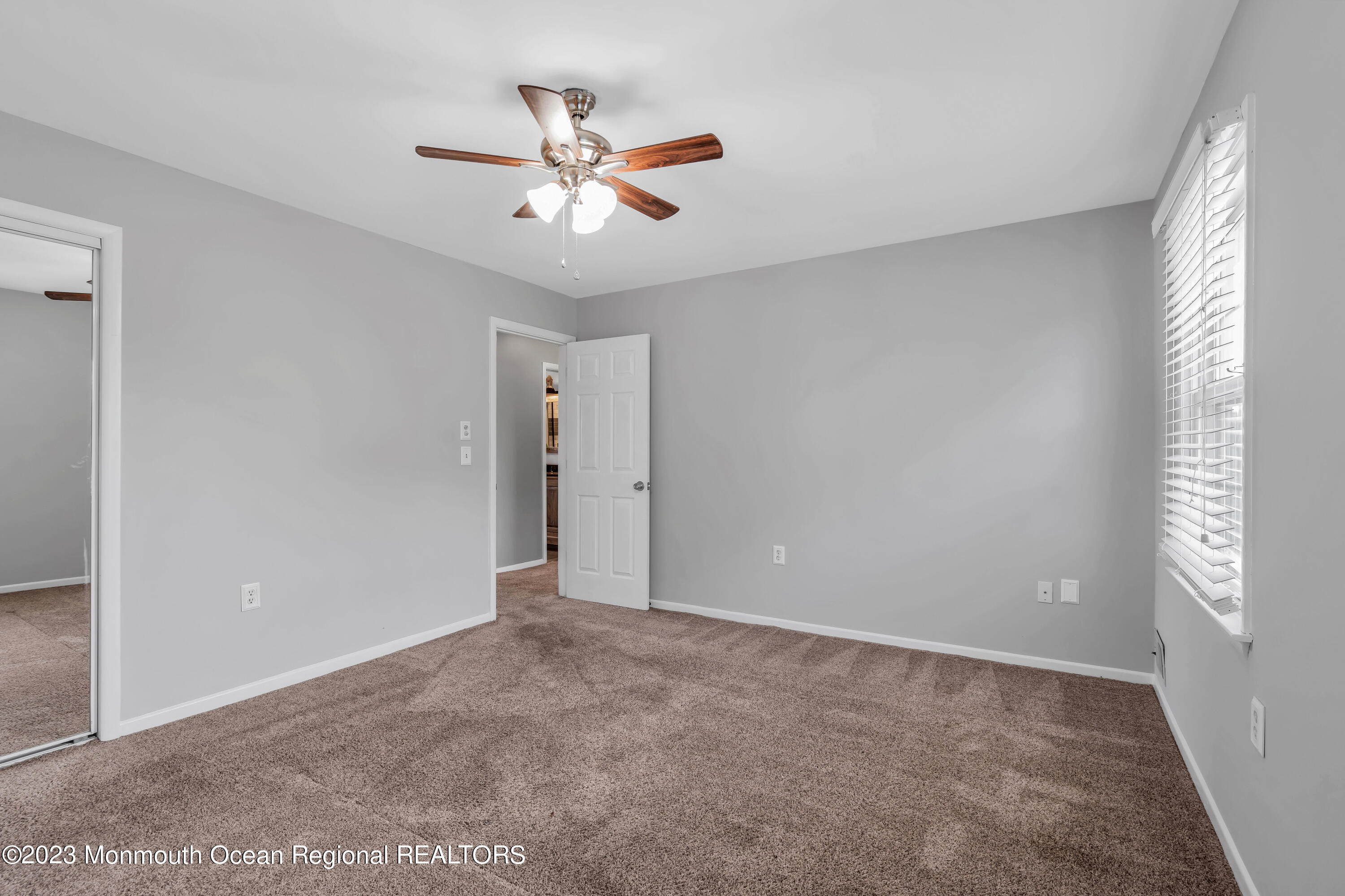 19 Poplar Street Howell, NJ 07731 - Photo 35 of 62 a view of an empty room with a window