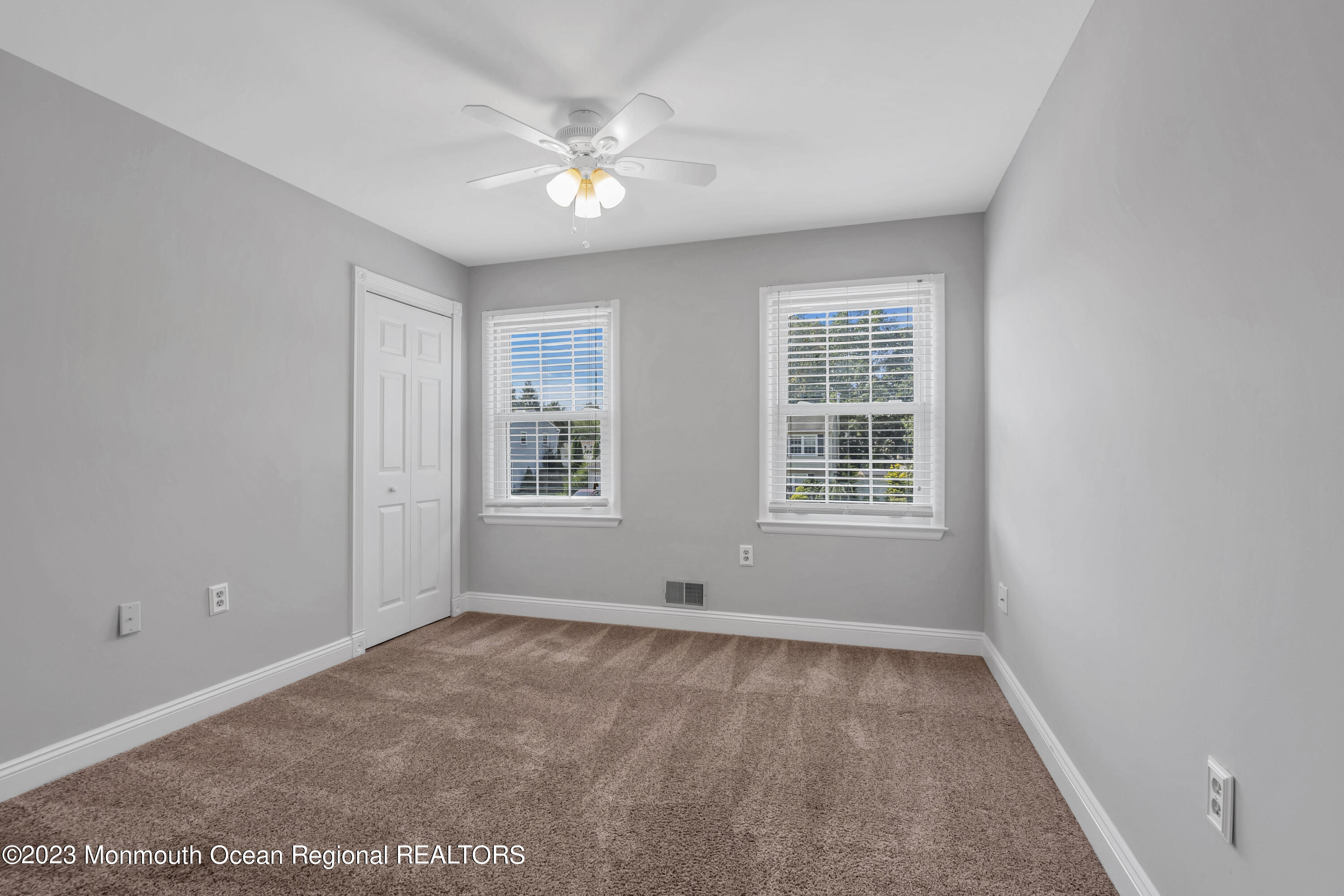 19 Poplar Street Howell, NJ 07731 - Photo 36 of 62 a view of wooden floor and windows in a room