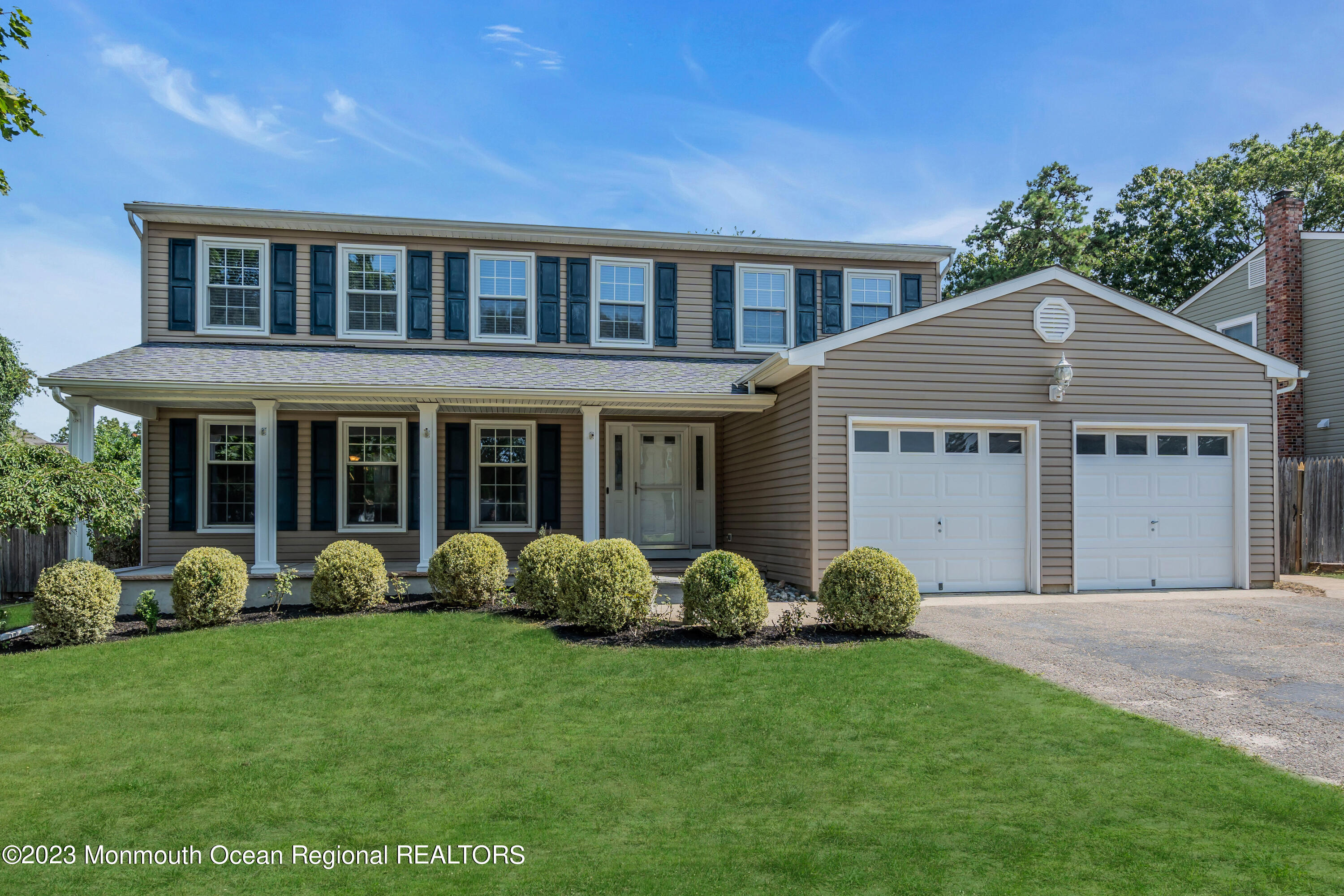 19 Poplar Street Howell, NJ 07731 - Photo 4 of 62 a front view of a house with garden