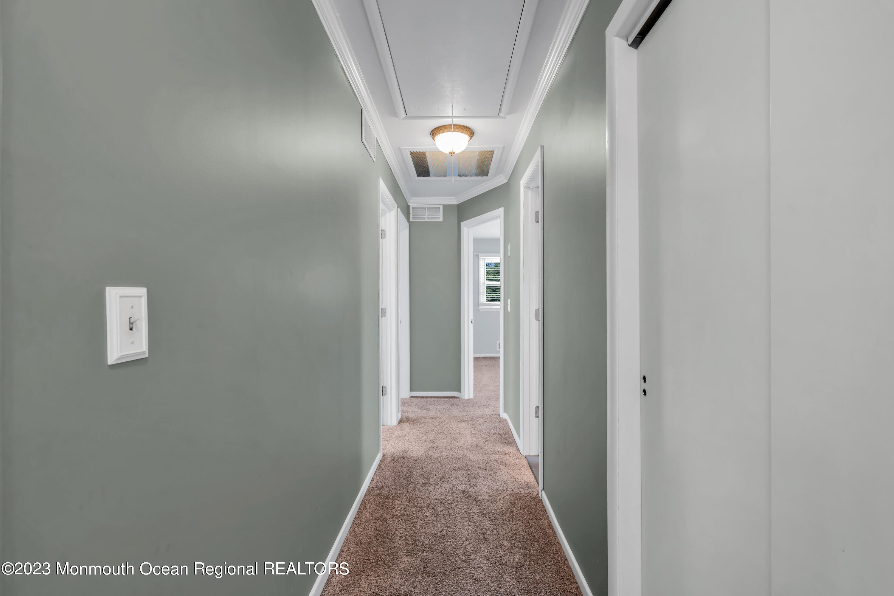 19 Poplar Street Howell, NJ 07731 - Photo 42 of 62 a view of a hallway with wooden floor