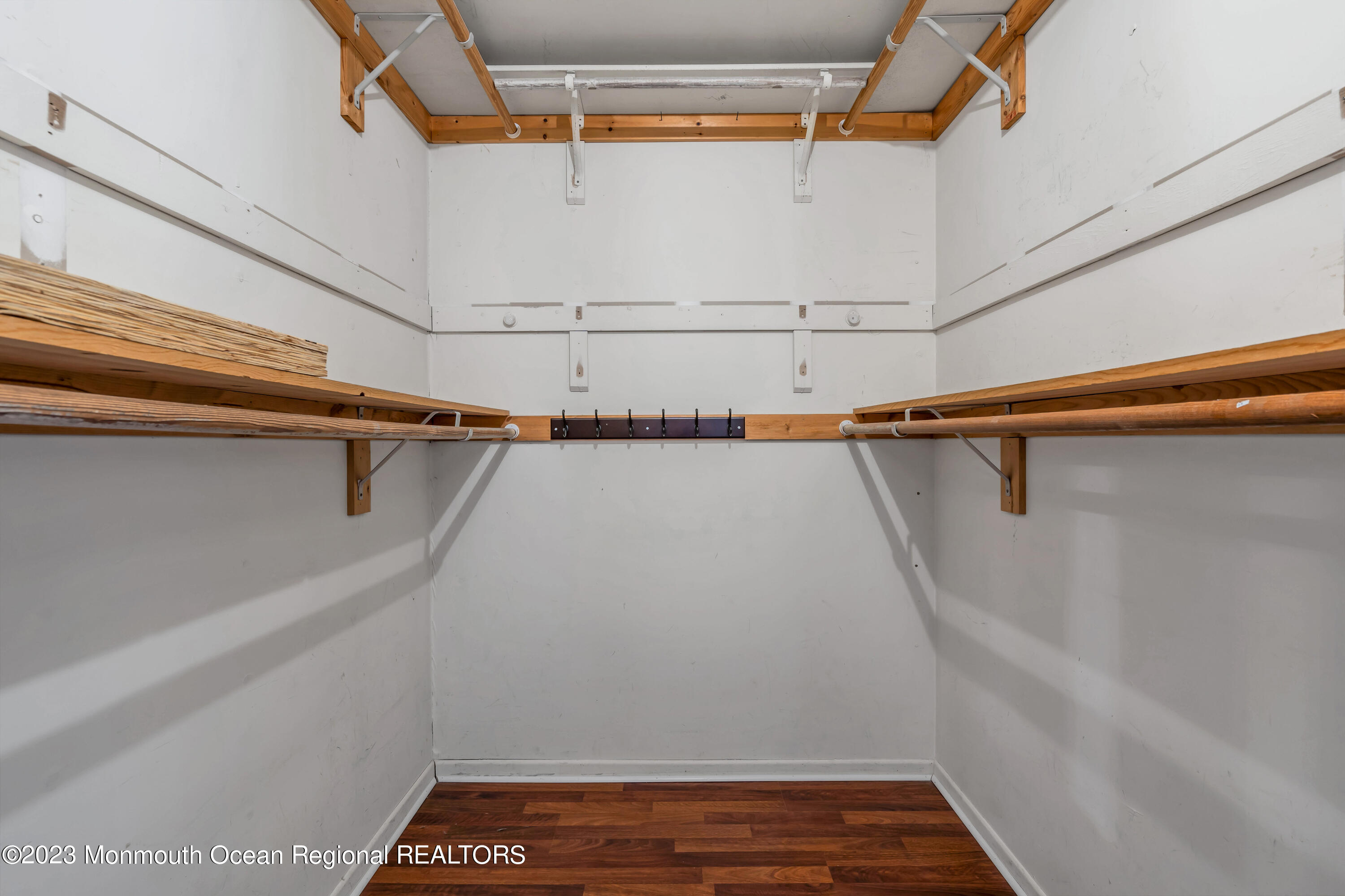 19 Poplar Street Howell, NJ 07731 - Photo 44 of 62 a view of a room with racks on the wall