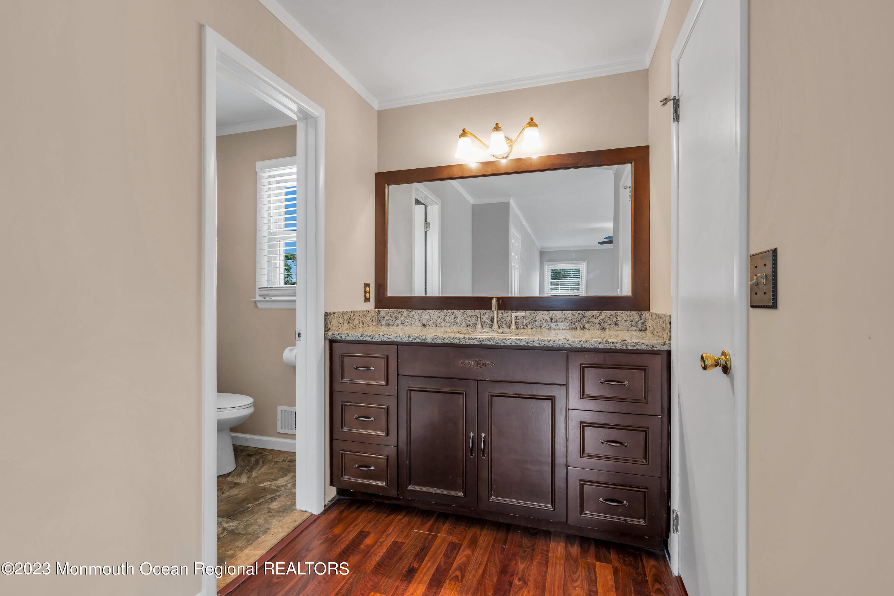 19 Poplar Street Howell, NJ 07731 - Photo 45 of 62 a bathroom with a sink and a mirror