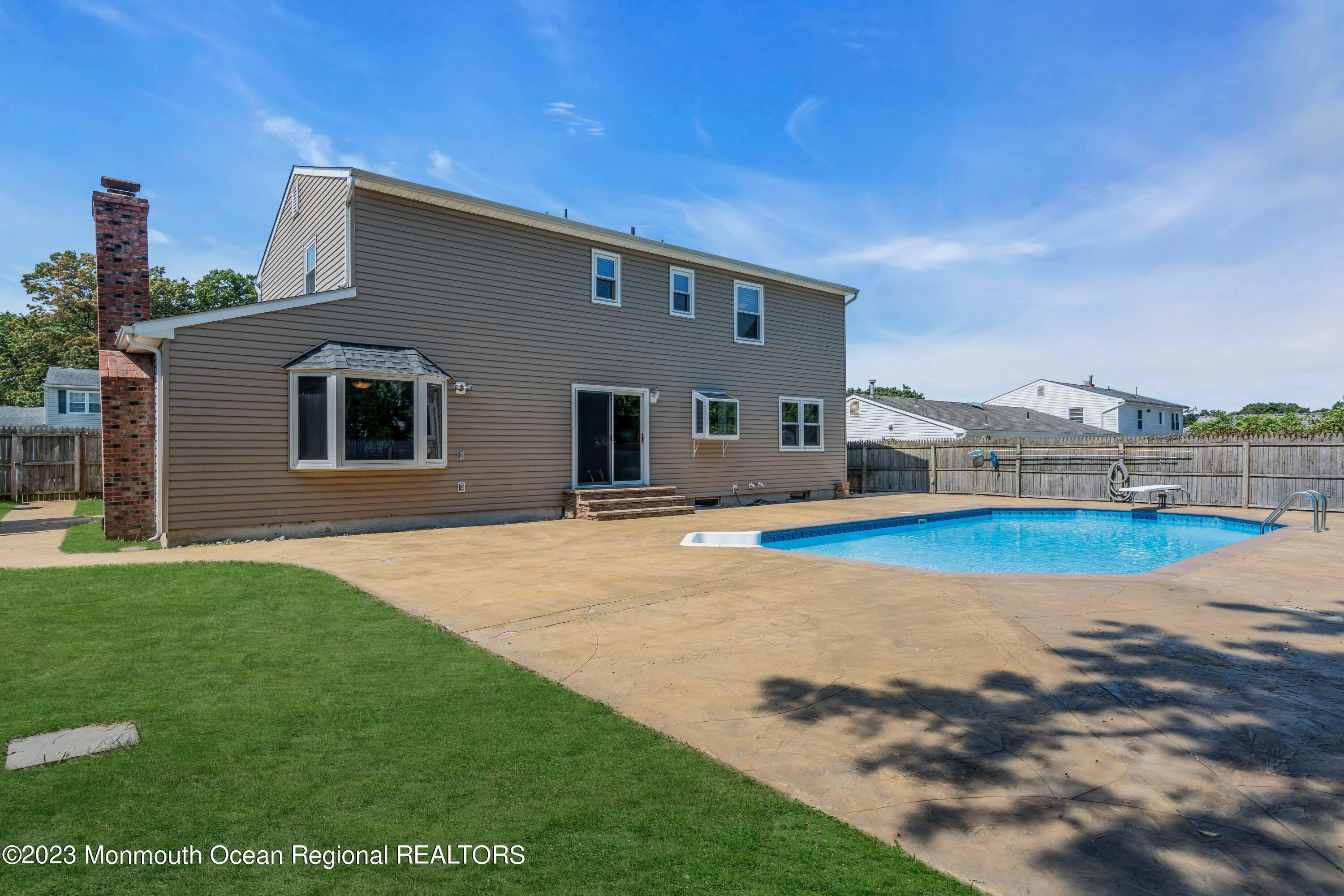 19 Poplar Street Howell, NJ 07731 - Photo 55 of 62 a view of outdoor space yard and swimming pool
