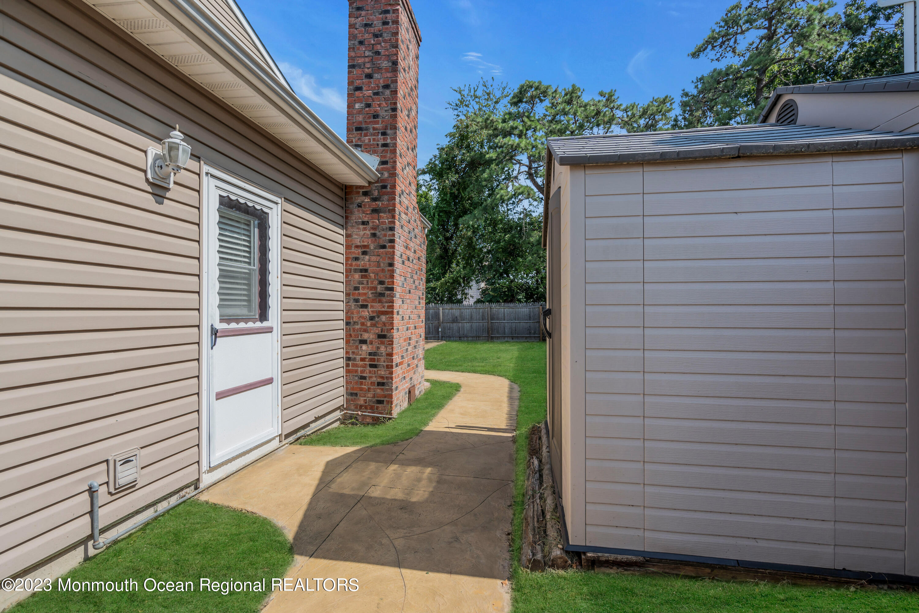 19 Poplar Street Howell, NJ 07731 - Photo 62 of 62 a view of a backyard with a garden