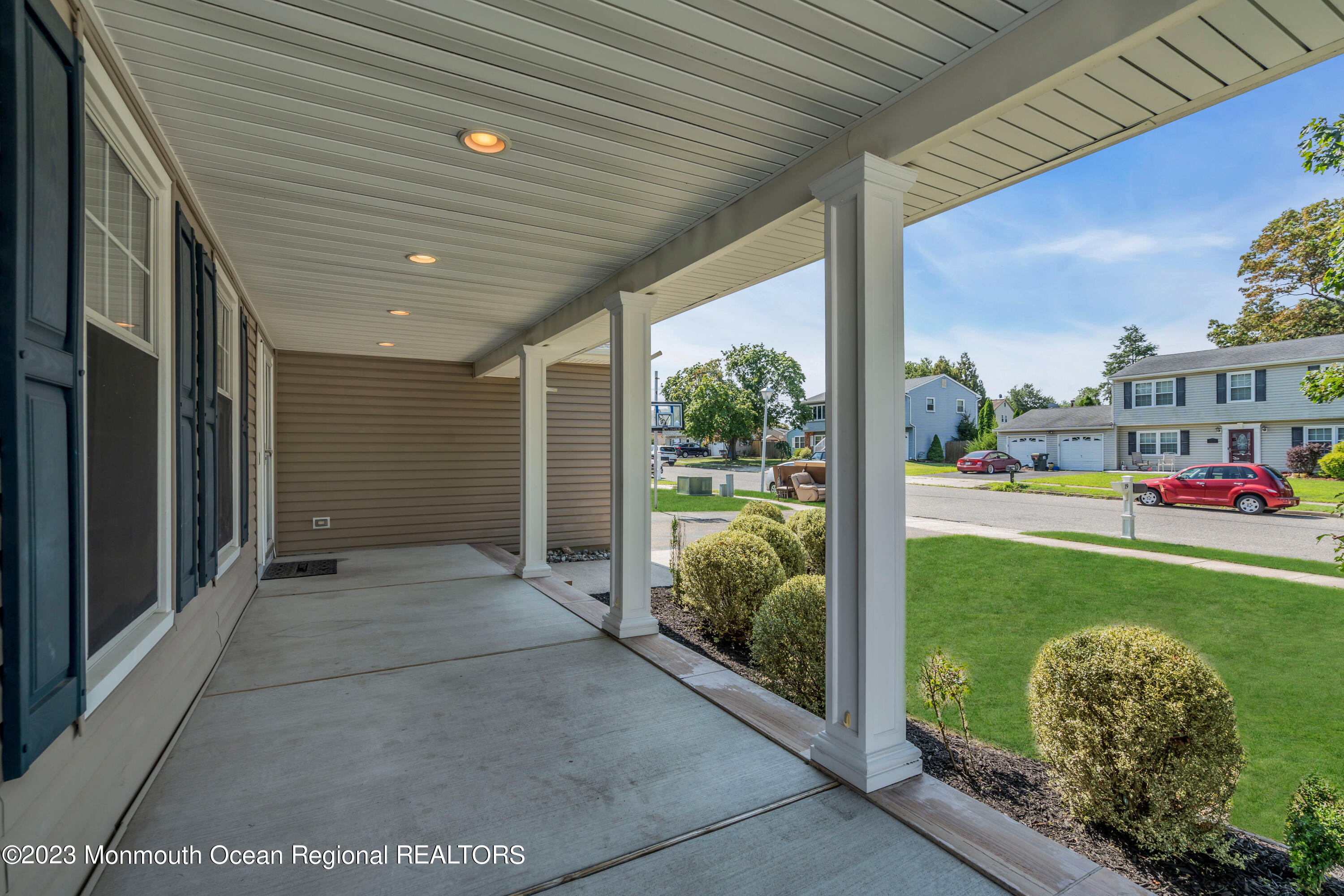 19 Poplar Street Howell, NJ 07731 - Photo 8 of 62 a view of a porch and garden