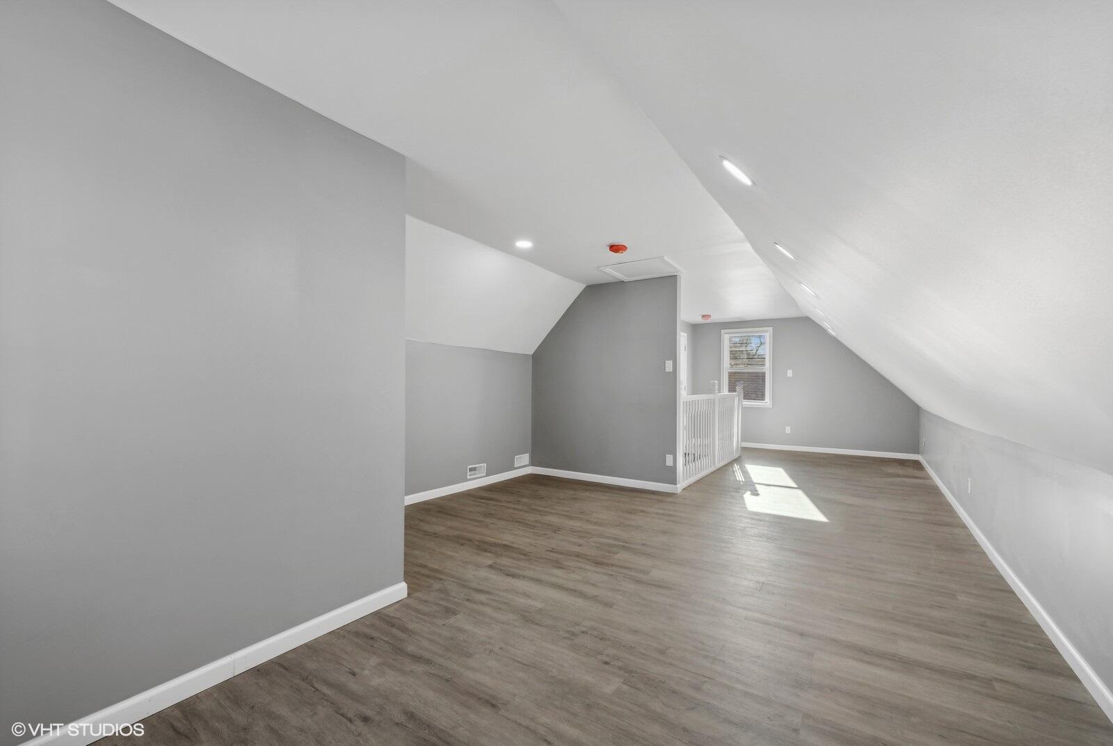 1025 Wallace Street Gary, IN 46404 - Photo 11 of 19 a view of an empty room with wooden floor