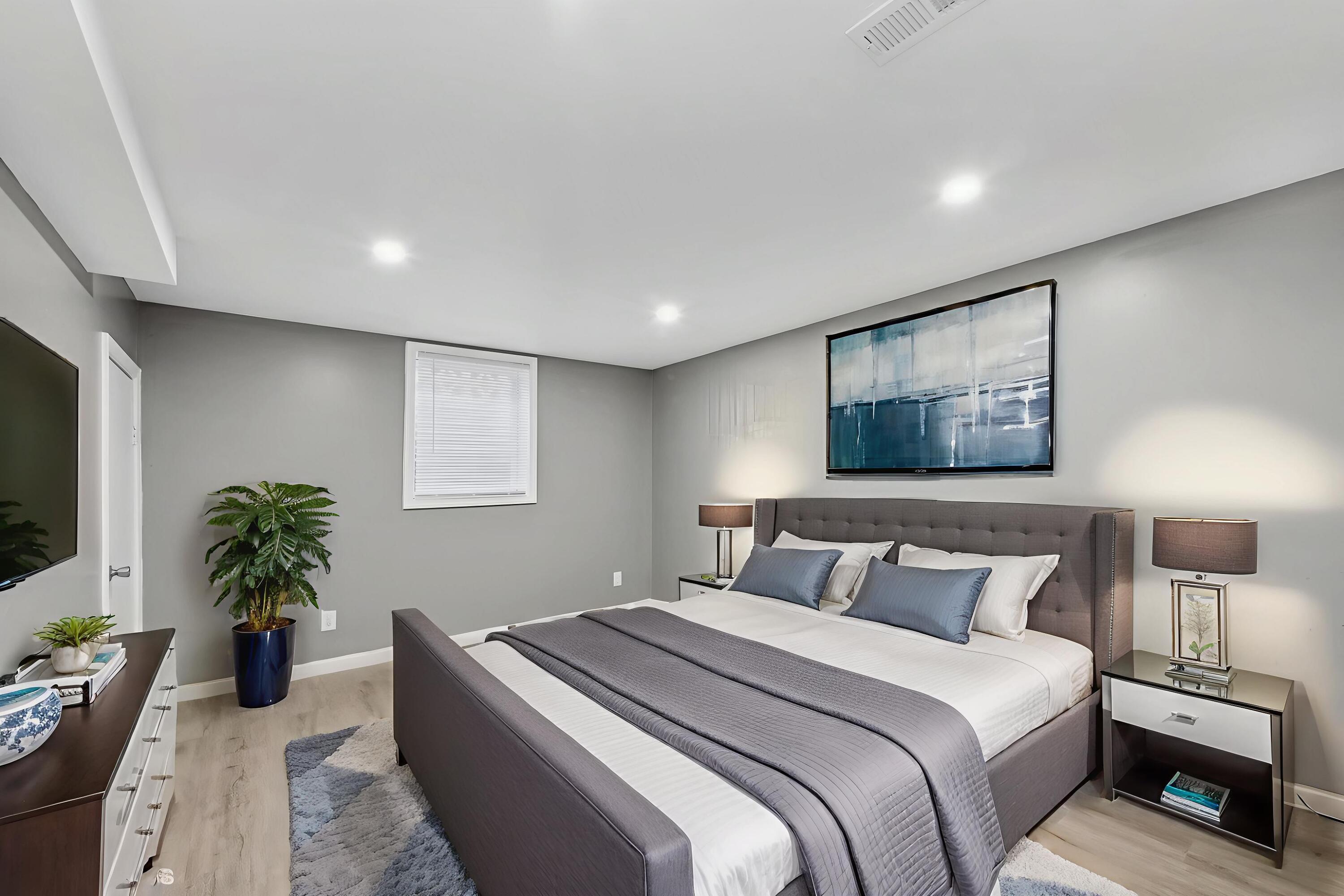 1025 Wallace Street Gary, IN 46404 - Photo 19 of 19 a bedroom with a bed and a potted plant