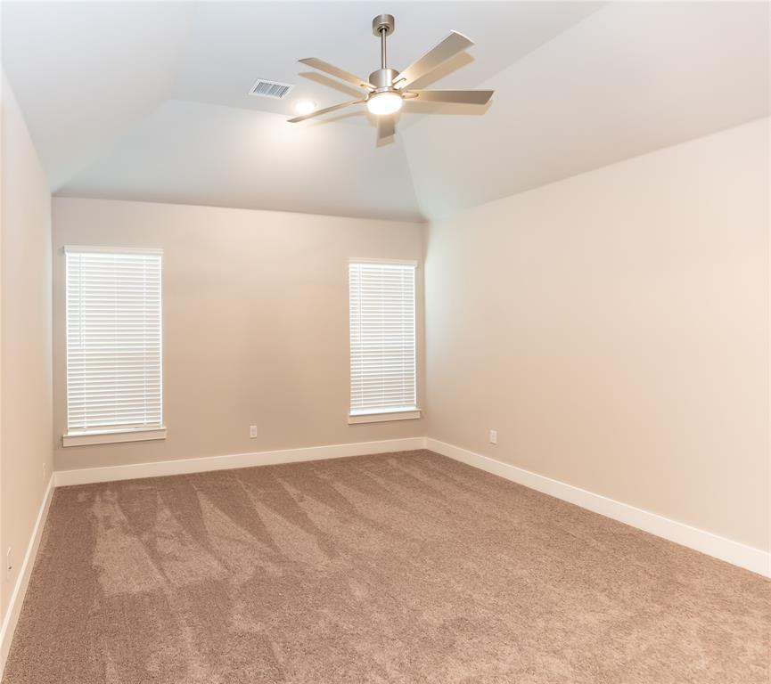 6124 Shasta Creek Road Celina, TX 75009 - Photo 7 of 27 a view of an empty room with a window