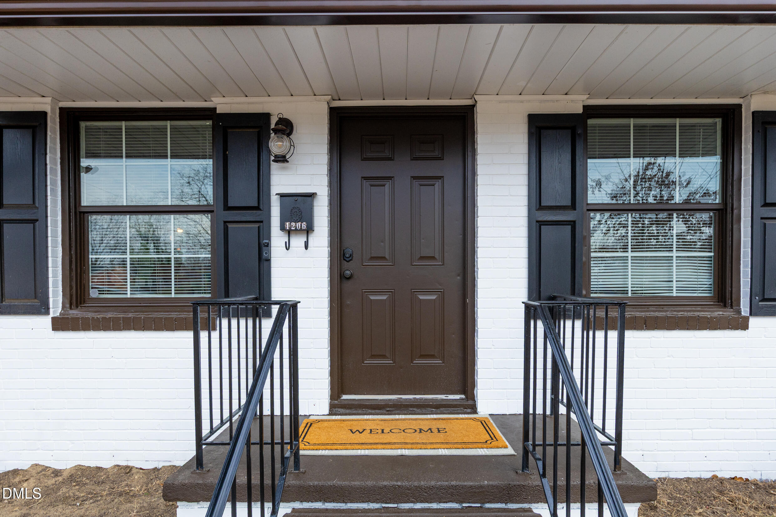 1206 Downing Road Raleigh, NC 27610 - Photo 2 of 13 a view of front door of house