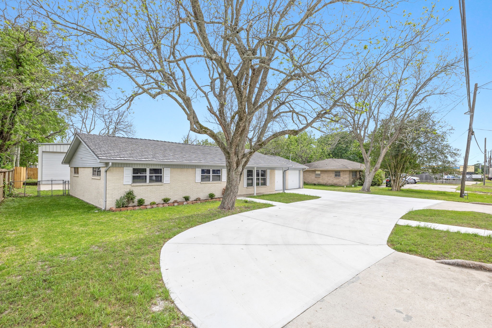 202 Massey Tompkins Road Baytown, TX 77521 - Photo 3 of 47 a view of a house with a yard