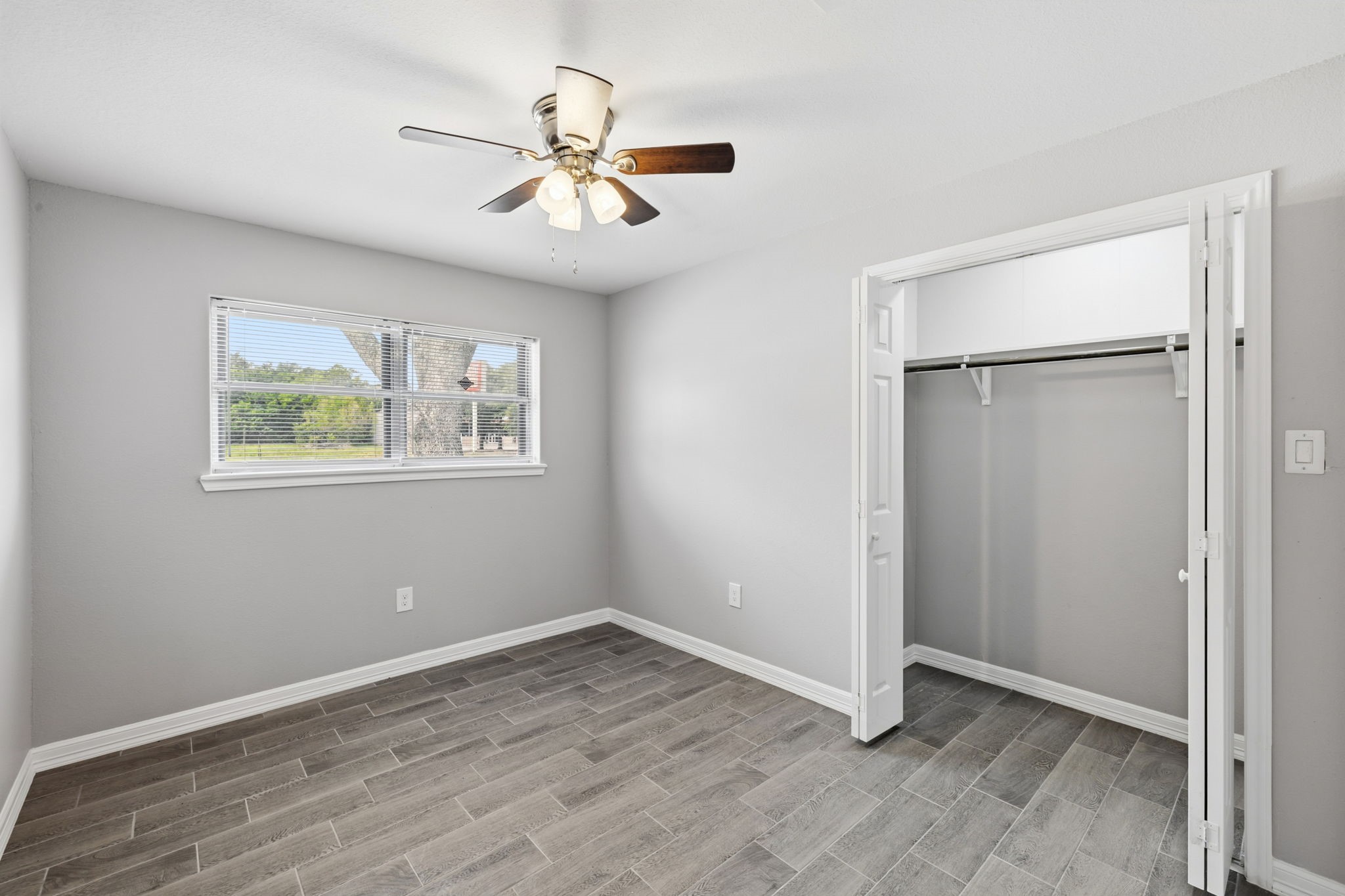 202 Massey Tompkins Road Baytown, TX 77521 - Photo 32 of 47 a view of an empty room with a window