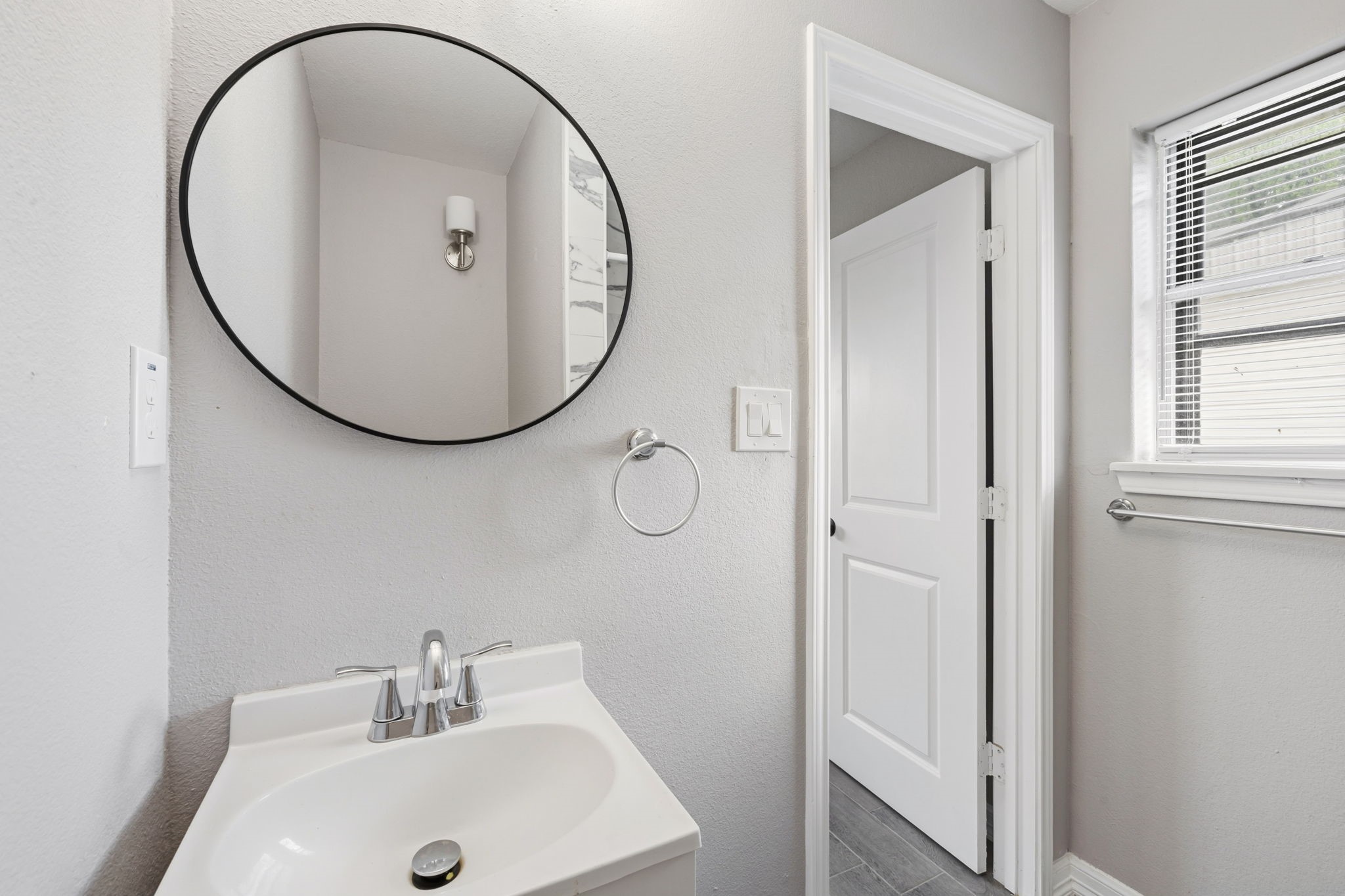 202 Massey Tompkins Road Baytown, TX 77521 - Photo 37 of 47 a bathroom with a sink and a mirror
