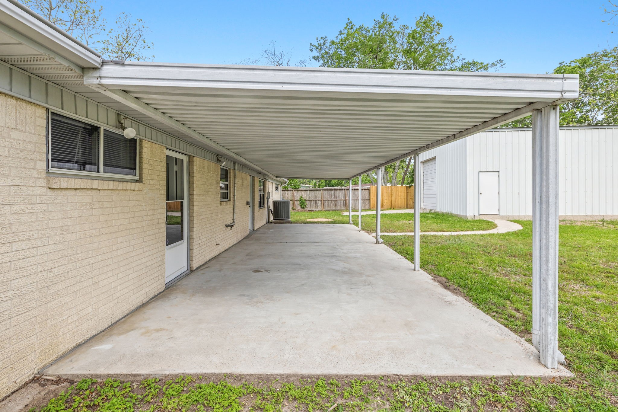 202 Massey Tompkins Road Baytown, TX 77521 - Photo 41 of 47 a view of a porch