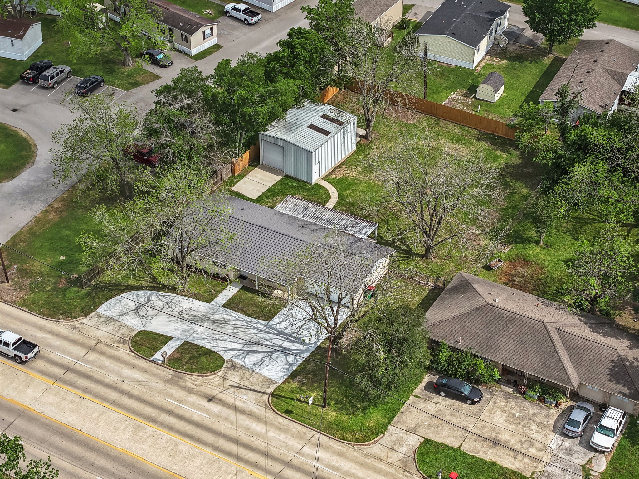 202 Massey Tompkins Road Baytown, TX 77521 - Photo 5 of 47 an aerial view of a house with a yard