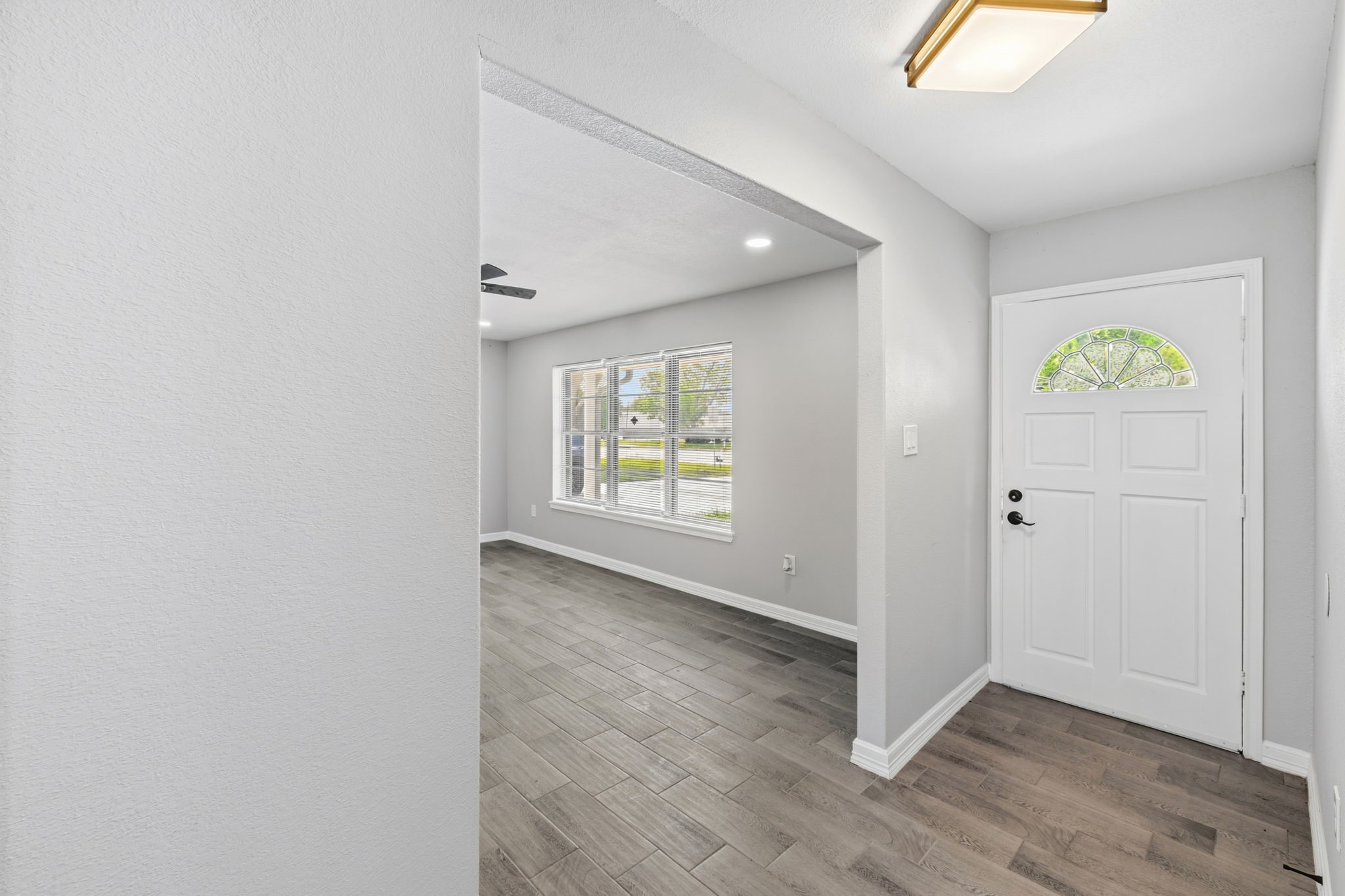 202 Massey Tompkins Road Baytown, TX 77521 - Photo 6 of 47 an empty room with windows and closet