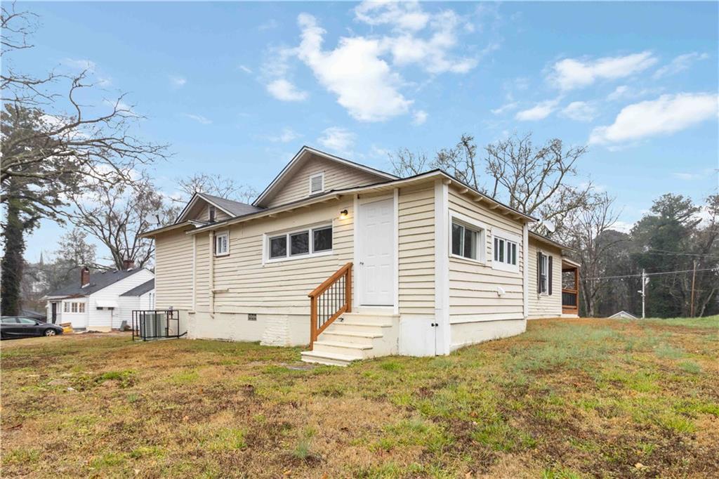 2141 Fairburn Road Southwest Atlanta, GA 30331 - Photo 29 of 30 a view of a house with a yard