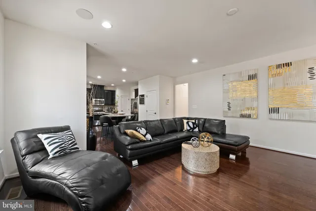 a view of a hallway with a window and couch