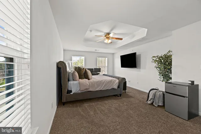 a bathroom with a sink vanity and a mirror