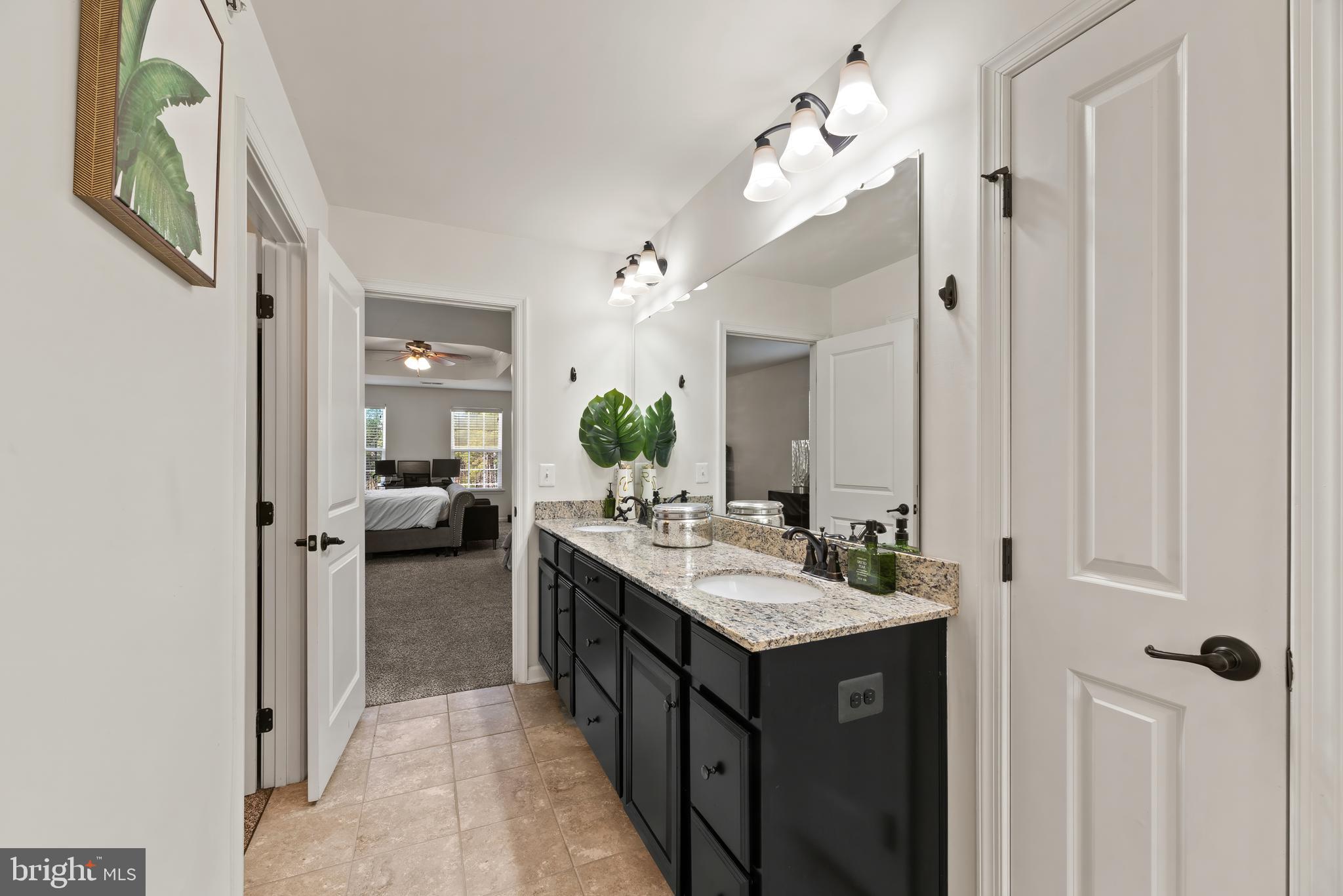 17857 Sugarberry Road Dumfries, VA 22026 - Photo 29 of 53 En-suite primary bathroom