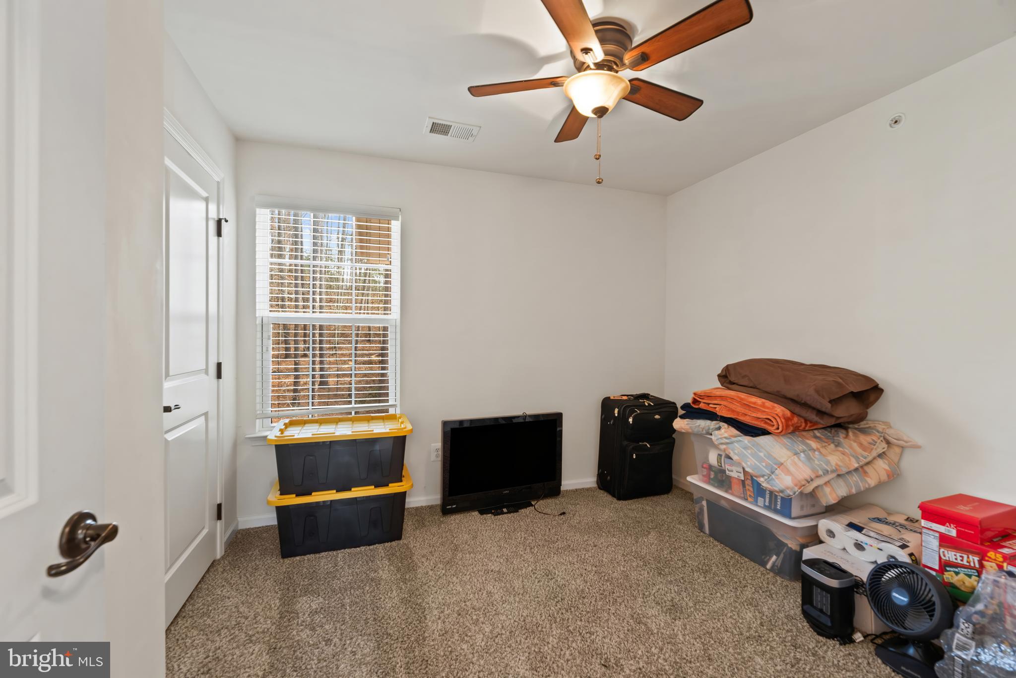 17857 Sugarberry Road Dumfries, VA 22026 - Photo 37 of 53 a bedroom with furniture and a window
