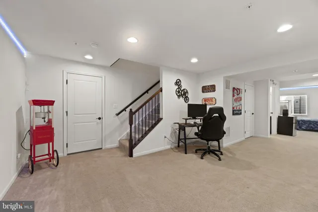 a bedroom with a bed and a mirror