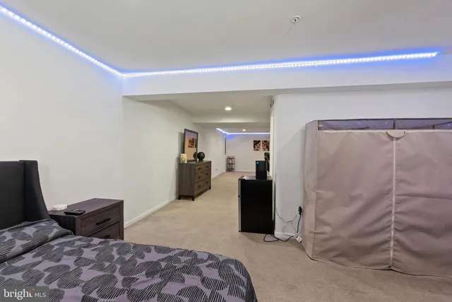 a bathroom with a sink vanity and mirror