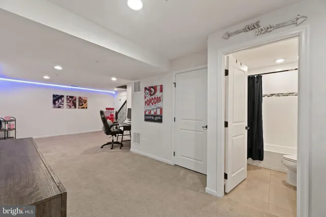 a view of a room with storage and utility room