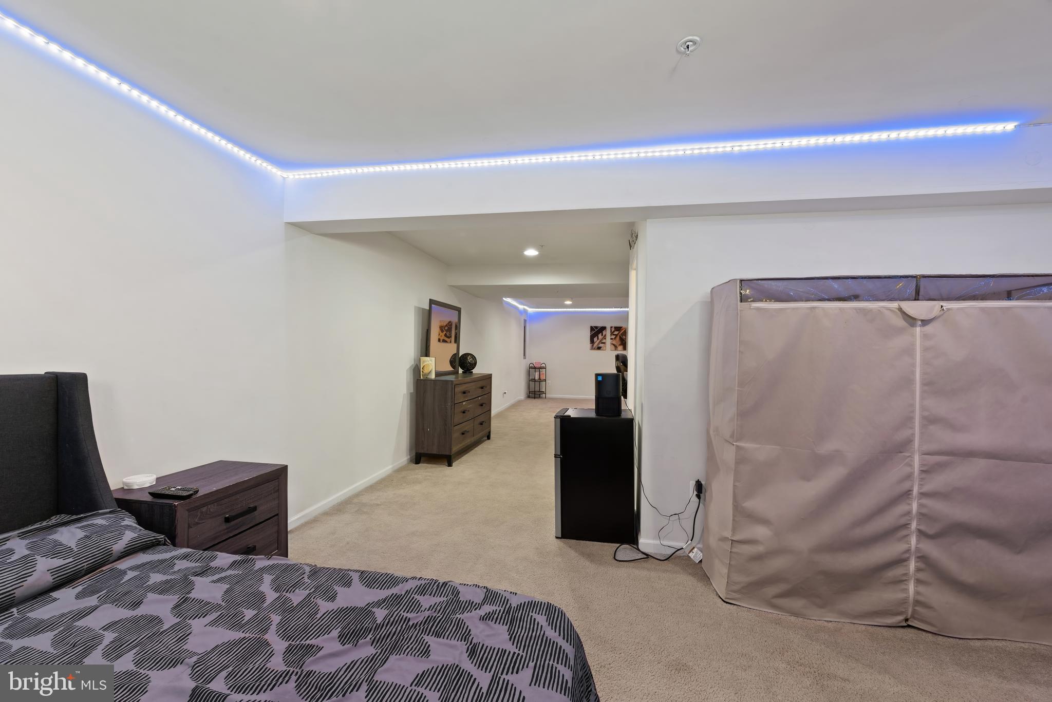 17857 Sugarberry Road Dumfries, VA 22026 - Photo 46 of 53 a bed room with a bed and a television