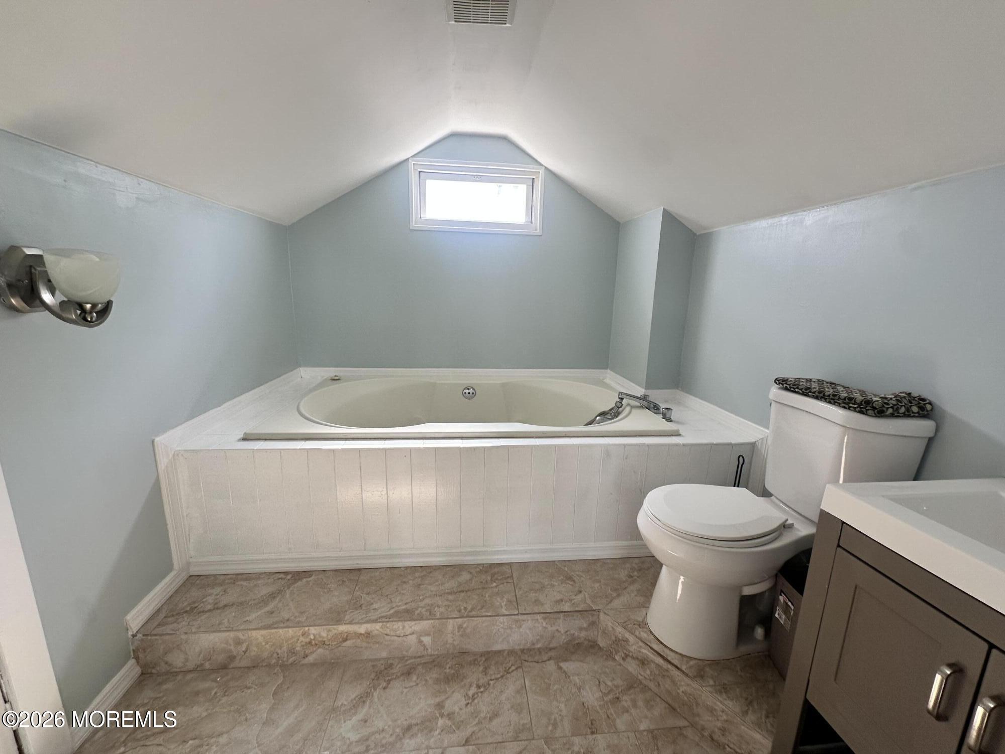 4 Spring Street Beachwood, NJ 08722 - Photo 28 of 31 a view of bathroom with a bathtub and toilet