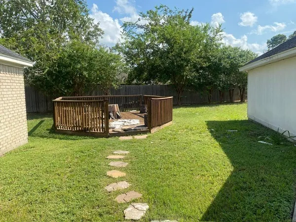 a view of a wooden fence