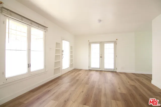 a kitchen with stainless steel appliances granite countertop a stove and a refrigerator