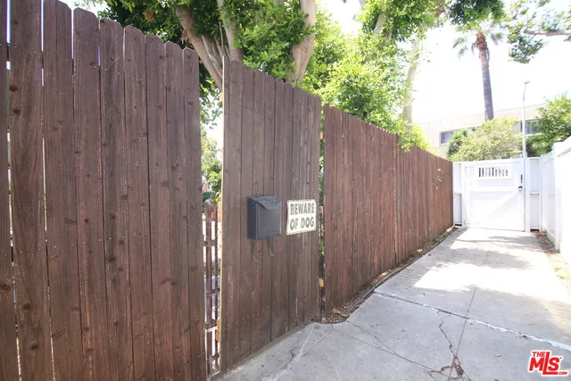 a view of entryway with wooden walls